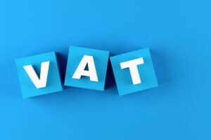 Guide to VAT registration in the UK outlining when businesses must register, £90,000 turnover threshold, and how to apply through HMRC.